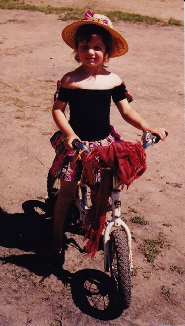 On her bike, 1990 