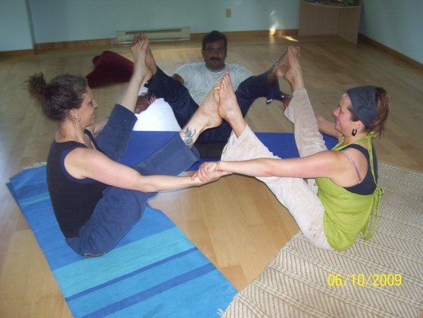 Dharmesh, Amy and I in Triple Navasana