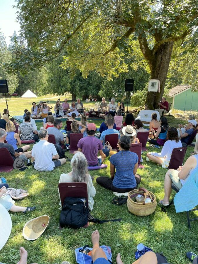 Kirtan on the mound at the Salt Spring Centre of Yoga Annual Community Yoga Retreat